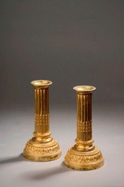 Paire de flambeaux en bronze doré d'époque...