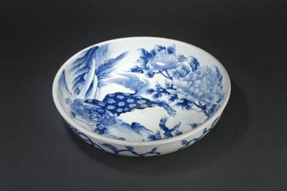 Grand plat creux en porcelaine bleu blanc...