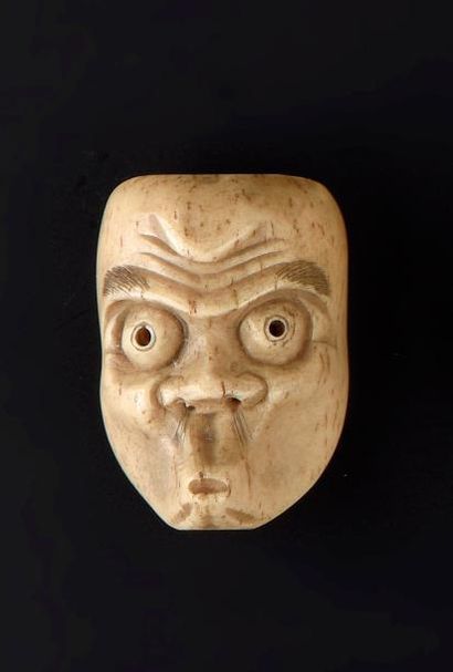 Netsuke en ivoire Japon, XIXe siècle Masque...