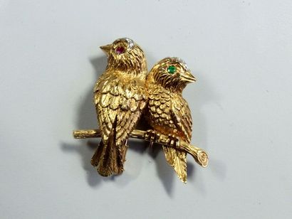 Clip en or jaune représentant deux oiseaux...