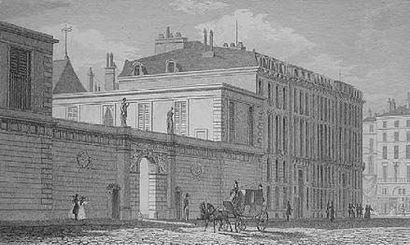 Fauteuil en acajou et placage d'acajou en...