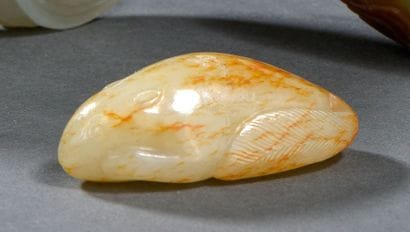 Pendentif en jade blanc et rouille
Chine,...