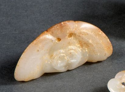 Pendentif en jade blanc et rouille
Chine,...