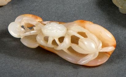 Pendentif en jade blanc et rouille
Chine,...