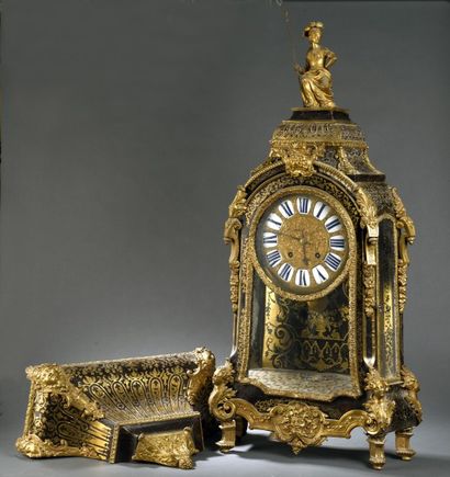 Cartel d’époque Louis XIV

En marqueterie...