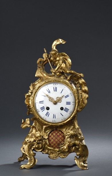 Pendule d’époque Louis XV

En bois sculpté...