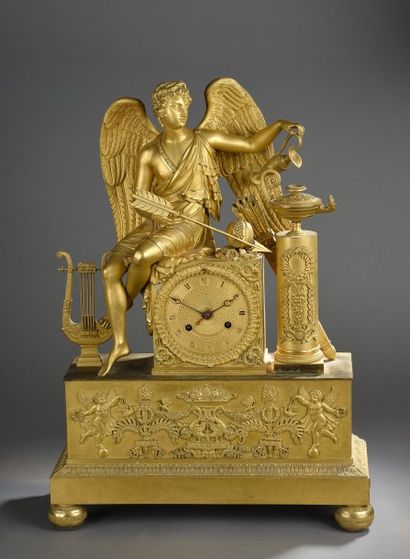 Pendule en bronze doré d'époque Empire

A...