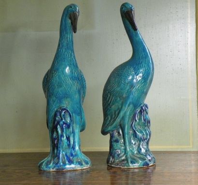 Deux grues en faïence bleue

H. 40 cm

