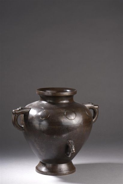 Vase en bronze niellé
Chine, XIXe siècle
La...