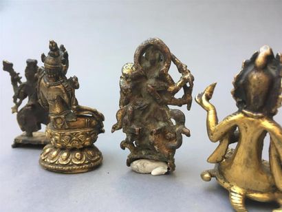 CINQ STATUETTES en bronze doré
Tibet, XVIIIe...
