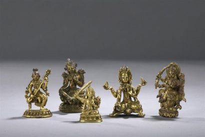 CINQ STATUETTES en bronze doré
Tibet, XVIIIe...