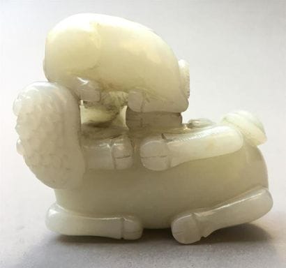 Groupe en jade blanc sculpté
Chine
Représentant...