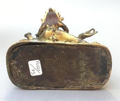 STATUETTE DE YAMA ET YAMI en bronze doré
Tibet,...