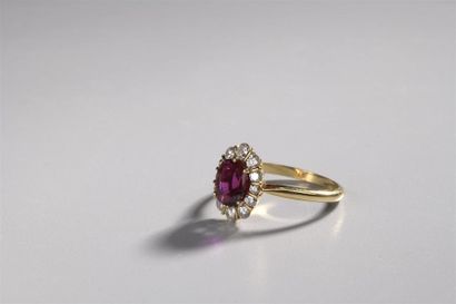 Bague marguerite en or jaune 18 K
(750 )...