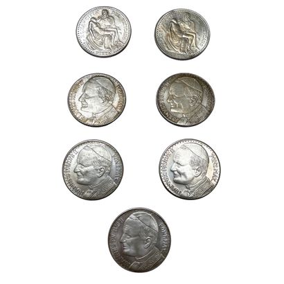 Lot of coins and currency including:
-7 medals...