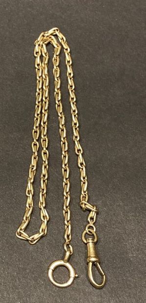 A watch chain in yellow gold 750°°%.
Gross...