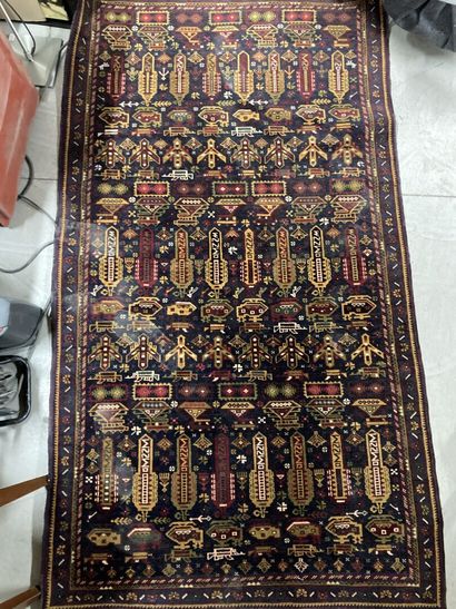 Two fine carpets, one of which is a Bukh...