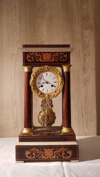 Portico clock in marquetry of light wood...
