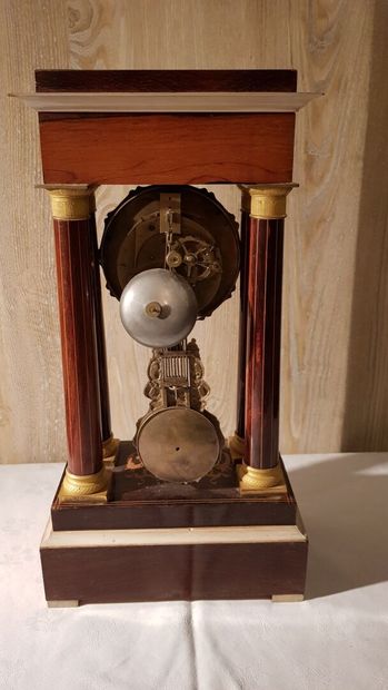 Portico clock in marquetry of light wood...