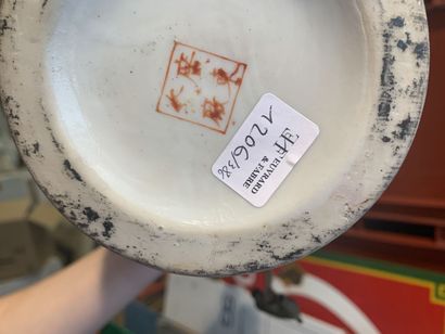 CHINA
Porcelain vase decorated with famille...