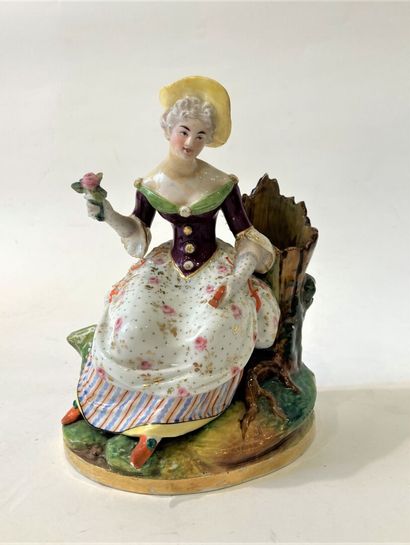 Pair of polychrome porcelain groups featuring...