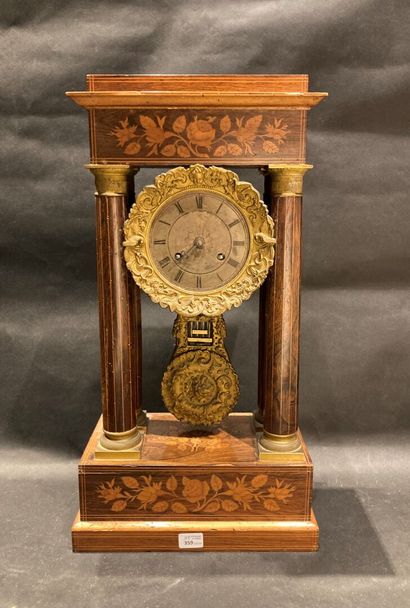 Portico clock in veneer with marquetry decoration
Napoleon...