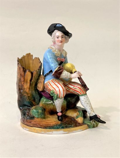 Pair of polychrome porcelain groups featuring...