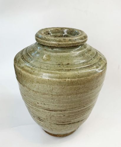 Vase of baluster form out of stoneware enamelled...