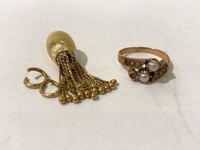 Gold lot including :
Yellow gold ring with...