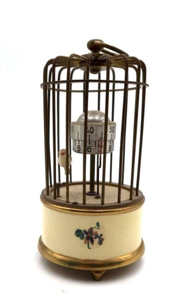 Set of two clocks : 
Brass clock Bird in...