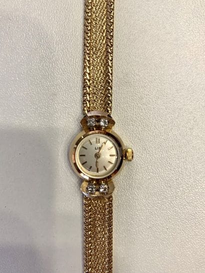 LIP
Montre de dame en or jaune 18K 750‰,...