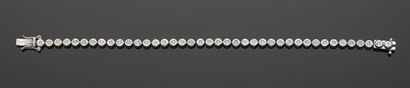 Bracelet en or gris 18K 750‰, ligne diamants...