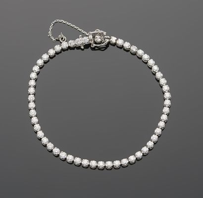 Bracelet ligne en or gris 18K 750‰, articulé,...