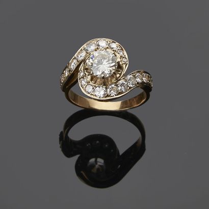 Bague en or deux tons 18K 750‰, tourbillon,...