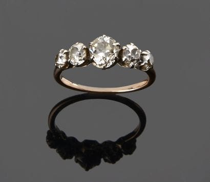 Bague en or deux tons 18K 750‰, jarretière,...