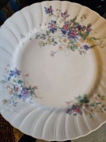 Two sets of white porcelain dinner services...