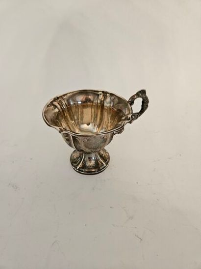 Two silver cups and two silver saucers with...