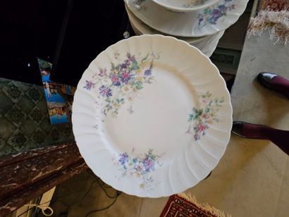 Two sets of white porcelain dinner services...