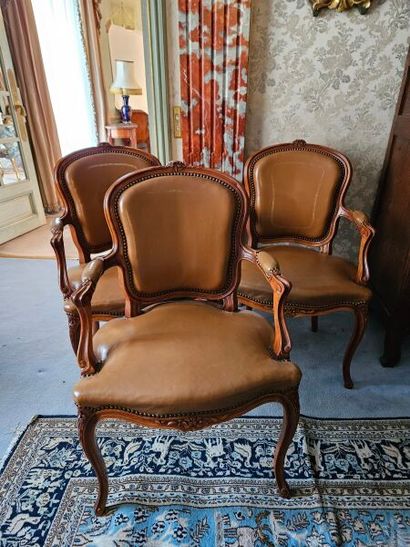 Suite of three cabriolet armchairs in natural...