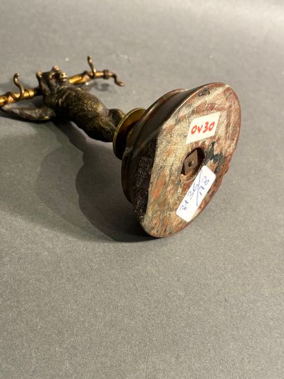 Bronze watch-holder featuring a bear on a...