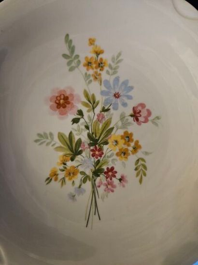 Two sets of white porcelain dinner services...