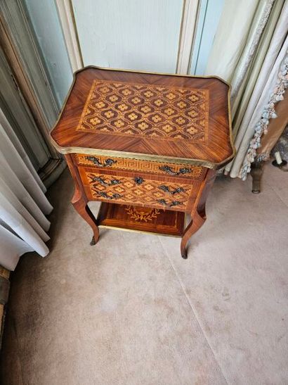 Living room table opening to three drawers...