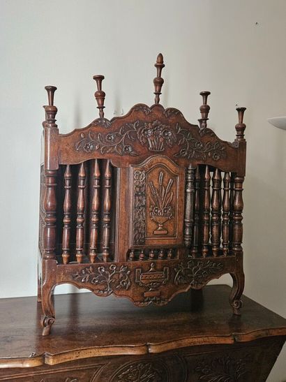 Turned, molded and carved walnut pan with...
