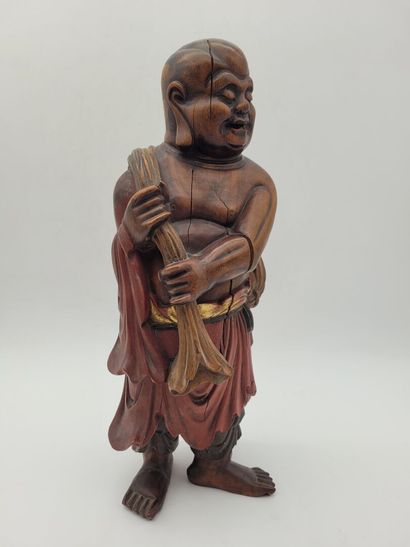 CHINA
Wooden sculpture of Lohan, wearing...