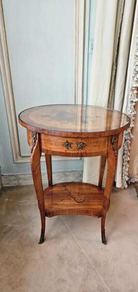Oval-shaped coffee table in wood veneer and...