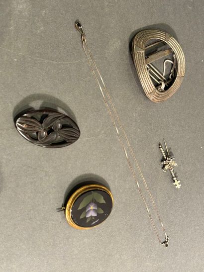 Lot including three brooches, one representing...