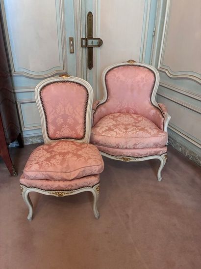Bergère and chair in cream and gold lacquered...