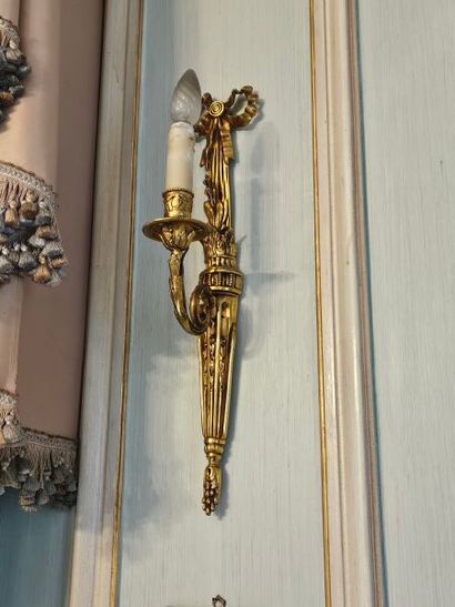Pair of single-light ormolu sconces 
Fluted...