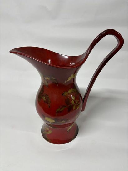 CHINA 
Red lacquer ewer decorated with gold...