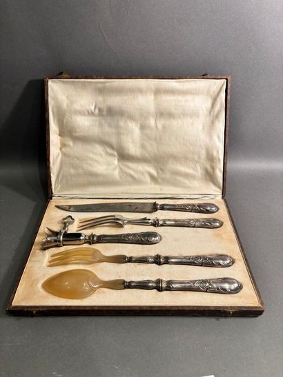 Set including a carving set, a leg of lamb...
